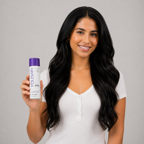 FOLIGAIN Triple Action Conditioner for thinning hair women with 2% TRIOXIDIL®, showing the conditioner bottle and hair strands.