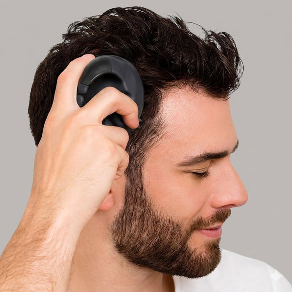FOLIGAIN Canada scalp therapy exfoliator and massager tool in black, designed for scalp cleansing and stimulation.