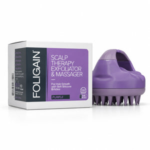 FOLIGAIN Canada scalp therapy exfoliator and massager tool in purple with textured bristles for scalp cleansing and massage.
