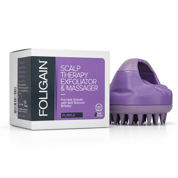 FOLIGAIN Canada scalp therapy exfoliator and massager tool in purple with textured bristles for scalp cleansing and massage.