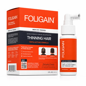 FOLIGAIN Triple Action Complete Formula for thinning men's hair topical lotion with 10% TRIOXIDIL®, in a clear bottle with applicator.