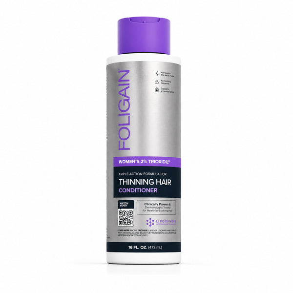 FOLIGAIN Canada triple-action conditioner for thinning women's hair with 2% TRIOXIDIL, 473ml bottle, shown in the image.