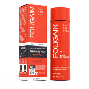 FOLIGAIN Triple Action Shampoo for Thinning Hair for Men with 2% TRIOXIDIL, featuring a bottle of shampoo with label and lather.
