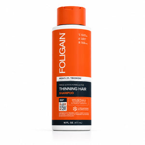 FOLIGAIN Triple Action Shampoo for thinning men's hair with 2% TRIOXIDIL, 473ml bottle, showing the shampoo bottle with label.