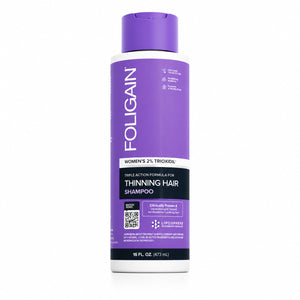 FOLIGAIN Triple Action Shampoo for thinning hair women with 2% TRIOXIDIL, 473ml bottle showing the product label and packaging