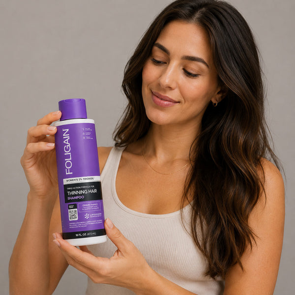 FOLIGAIN Triple Action Shampoo for thinning women's hair with 2% TRIOXIDIL, 473ml bottle, displaying the shampoo bottle and label