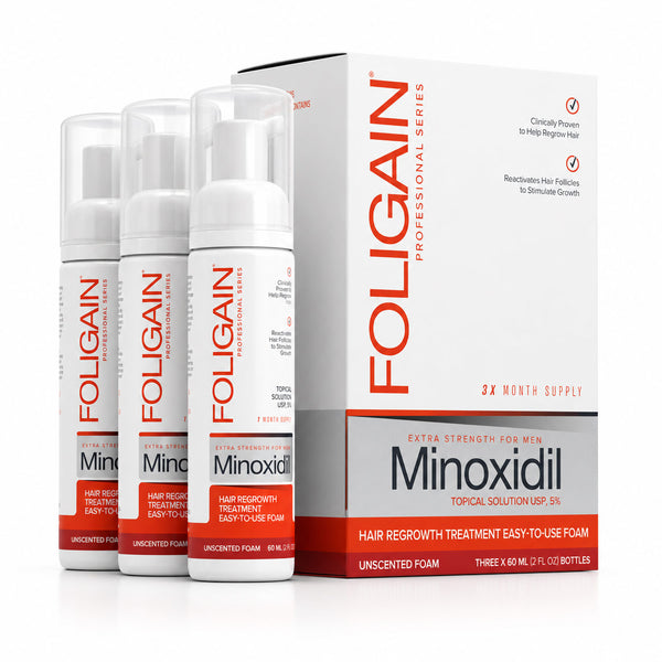 FOLIGAIN Ultra-Pure Minoxidil 5% hair regrowth foam for men, showing the foam applicator and packaging for 3-month supply.