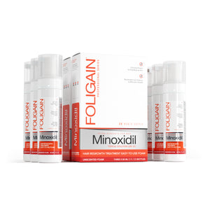 FOLIGAIN® Ultra-Pure Minoxidil 5% foam for men, 6-month supply, showing the foam container with applicator and product label.