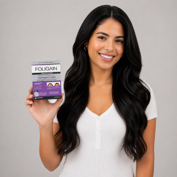 FOLIGAIN Triple Action Complete Formula topical lotion for women with 10% TRIOXIDIL® to help reduce thinning hair, shown in the image.