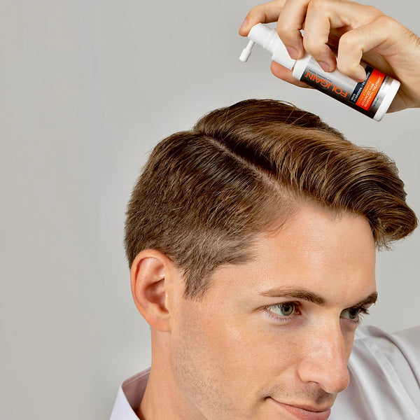 FOLIGAIN Advanced Hair Regrowth Topical Lotion for Men with 5% Minoxidil and TRIOXIDIL in a clear bottle.